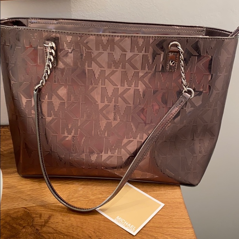 Michael Kors platinum vinyl handbag